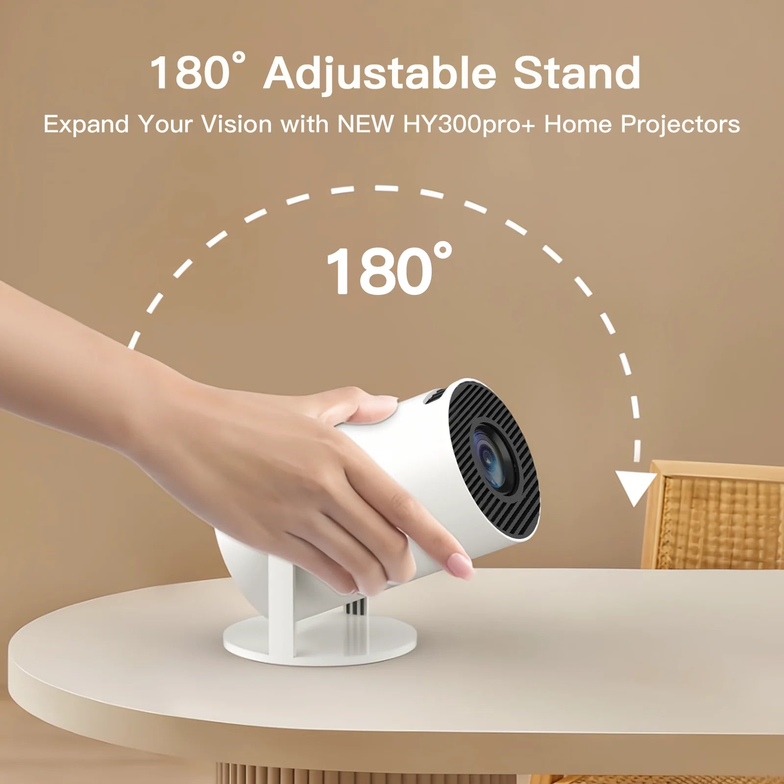 Hand adjusting a white projector on a beige surface with text about 180-degree adjustable stand.