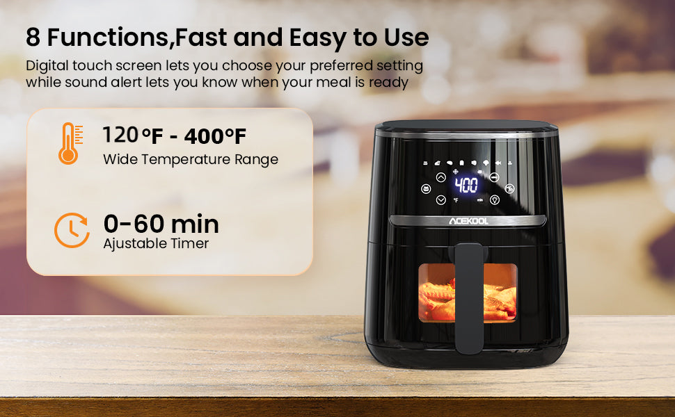 Digital air fryer with temperature and timer display on a wooden surface
